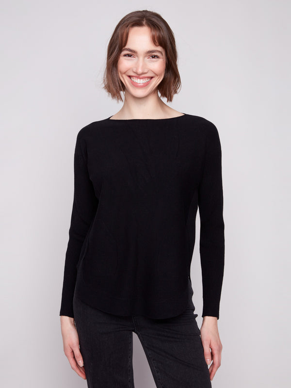 Stylish black knit sweater showcasing a flattering rounded hem design by Charlie B.