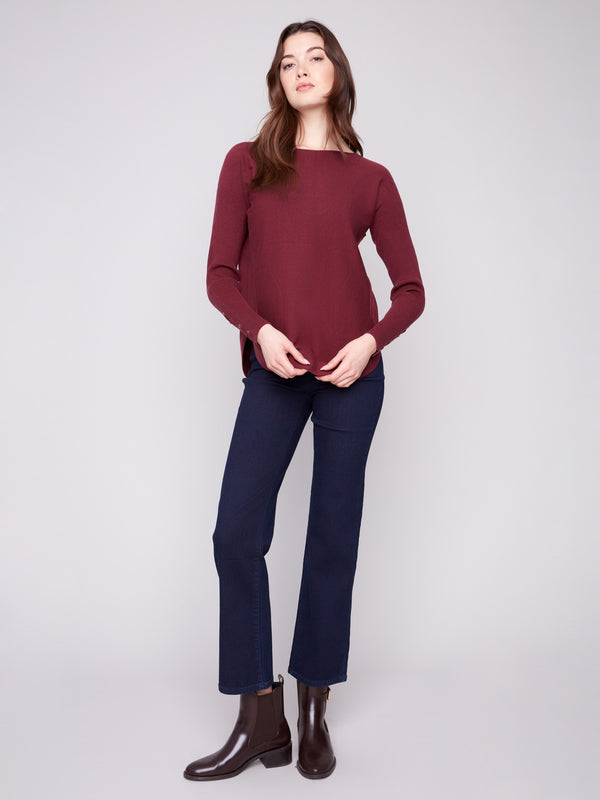 Cabernet sweater designed with an eye-catching rounded hem and sleek boat neck style by Charlie B.