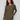 Spruce knit sweater featuring a stylish boat neck and side pockets for added convenience by Charlie B.