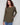 Spruce knit sweater featuring a stylish boat neck and side pockets for added convenience by Charlie B.