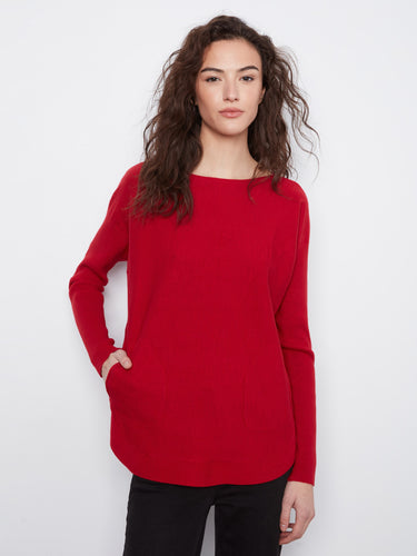 Elegant red sweater with a stylish boat neck, perfect for adding a touch of sophistication to any outfit. By Charlie B.