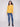 Elegant honey knit sweater with convenient side pockets for added functionality by Charlie B.