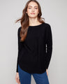 Black knit sweater featuring a boat neck design, complemented by long ribbed sleeves for a sleek look by Charlie B.