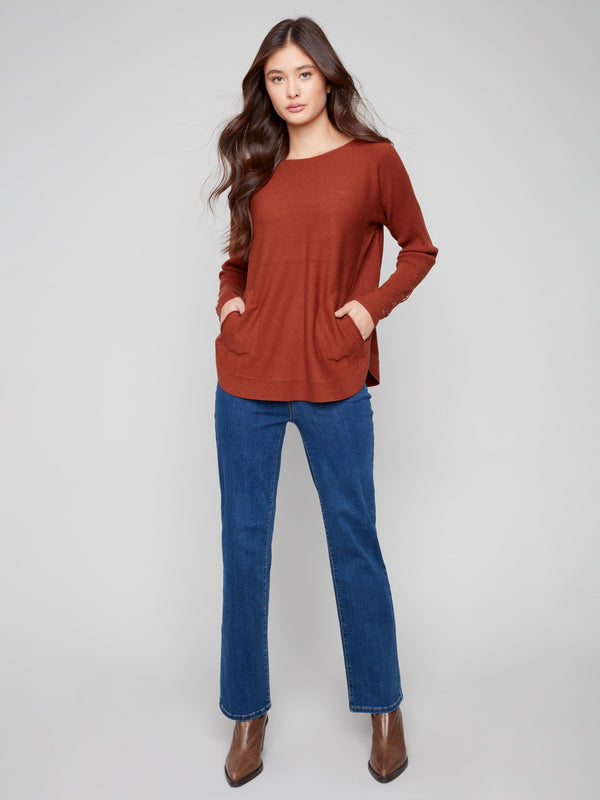 Chic sepia sweater with long ribbed sleeves and a flattering rounded hem design for added elegance by Charlie B.