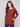 Comfortable sepia knit sweater with convenient side pockets and a modern boat neck style by Charlie B.