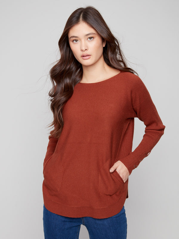 Comfortable sepia knit sweater with convenient side pockets and a modern boat neck style by Charlie B.