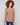 Knit sweater featuring a stylish boat neck and cozy design, perfect for any casual outing by Charlie B.