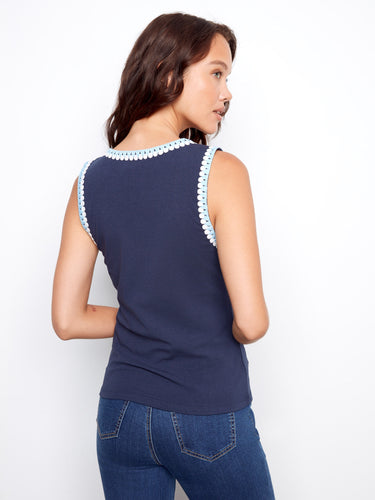 Chic navy tank top showcasing a beautifully crafted scoop neckline with crochet accents for a trendy look by Charlie B.