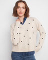 Sweater with a V-neckline and embroidered heart accents, paired with a layered shirt collar for a chic look by Charlie B.