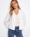 White jacket with a short length and frayed edges, perfect for casual outings. Accentuates your style effortlessly by Charlie B.