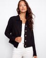 Featuring practical front pockets, this jacket combines functionality with fashionable design elements effortlessly. By Charlie B.