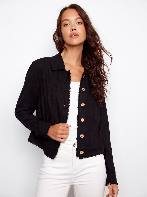 Featuring practical front pockets, this jacket combines functionality with fashionable design elements effortlessly. By Charlie B.