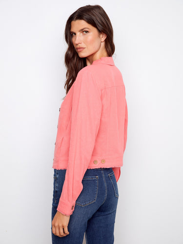 Elegant pink jacket with front button closure, offering both style and comfort. A must-have piece by Charlie B.