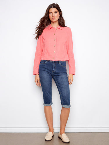 Stylish pink jacket highlighted by front pockets, combining functionality and fashion effortlessly by Charlie B.