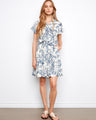 Linen-blend dress featuring a classic shirt collar and blue floral print, perfect for summer outings by Charlie B.