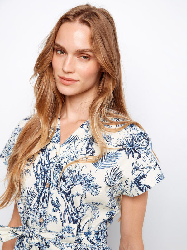 Embrace summer with this embroidered cotton dress featuring short sleeves and tailored collar details by Charlie B.