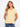 Yellow V-neck top with a relaxed fit, perfect for casual outings. Styled effortlessly with jeans for a laid-back look by Charlie B.