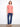 A classic V-neck design in coral with short sleeves, perfect for your everyday wardrobe essentials by Charlie B.