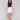 White linen blend skort with short length, styled with a black sleeveless top, by Charlie B.