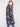 Geometric pattern crochet coat in twilight, complete with welt pockets on the front for added functionality by Charlie B.