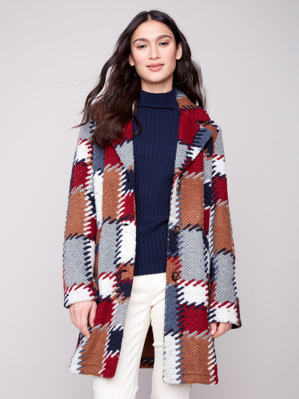 Crochet coat with tailored collar in a vivid plaid design, adding a touch of elegance to any outfit by Charlie B.