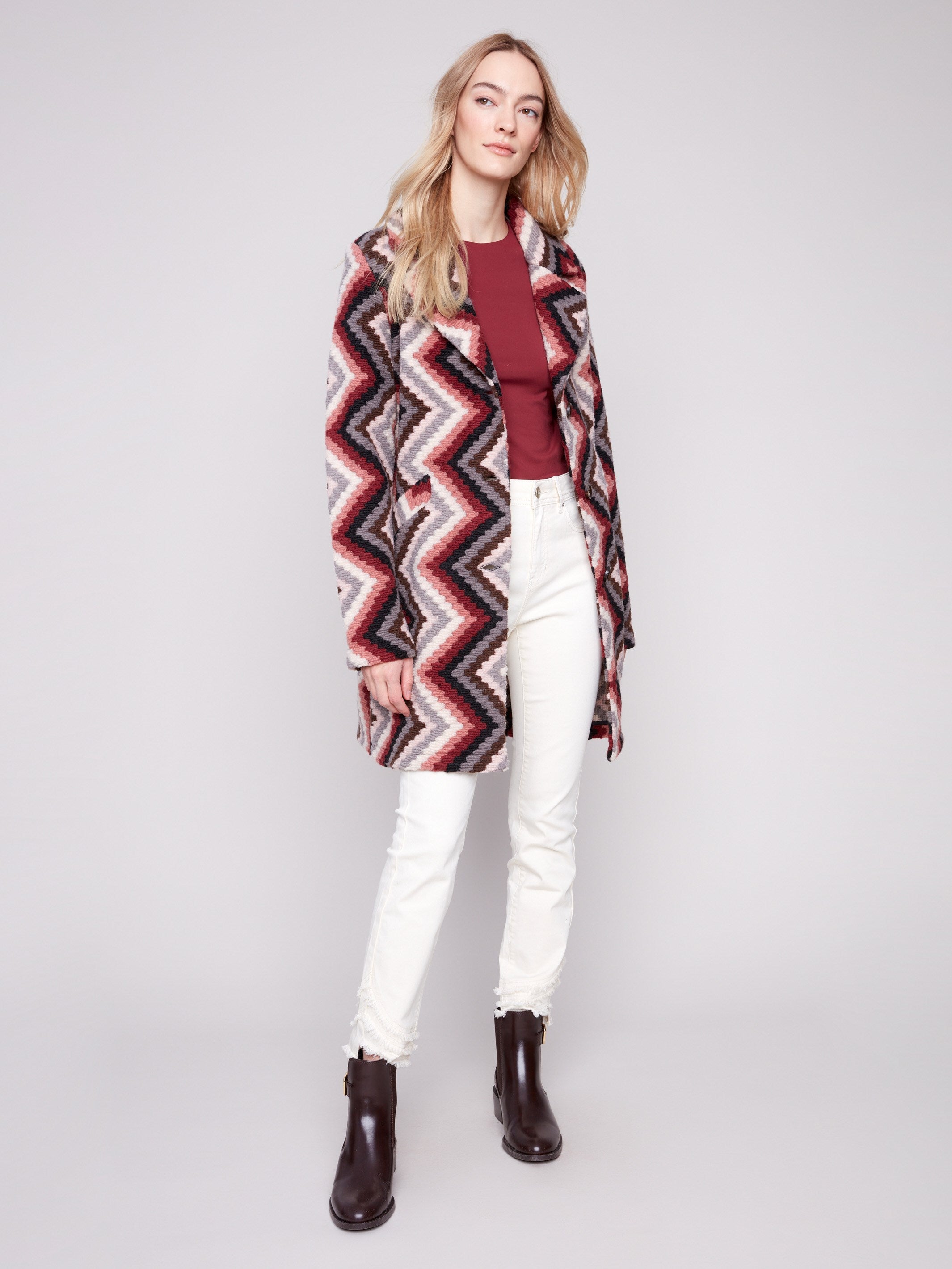 Elegant crochet coat in primrose, featuring unlined design and chic geometric pattern by Charlie B.
