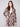 Geometric sepia coat featuring welt pockets on the front adds practicality to its stylish design by Charlie B.