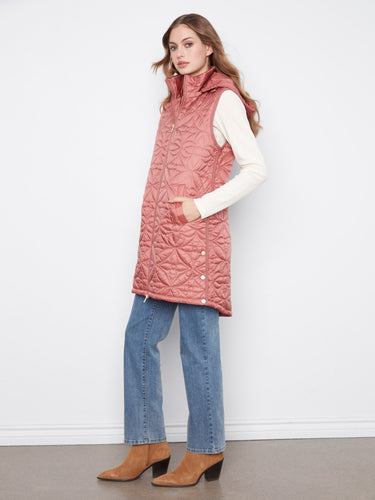 Enjoy the relaxed fit of this rosebud puffer vest, ideal for comfortable layering in any season by Charlie B.