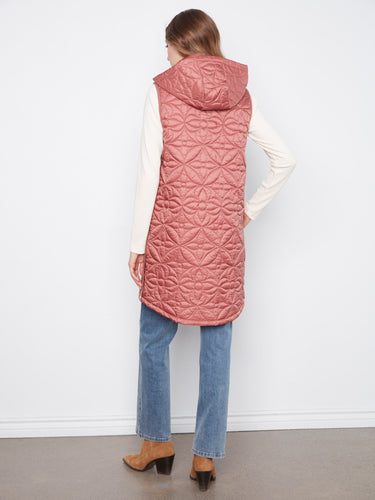 The rosebud vest includes convenient welt pockets, combining function with fashion effortlessly by Charlie B.