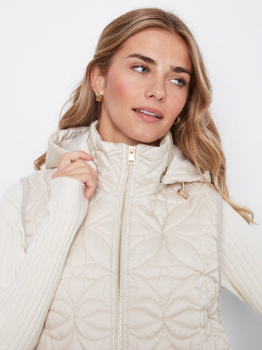 Welt pockets add functionality and convenience, making this vest both practical and fashionable for everyday wear by Charlie B.
