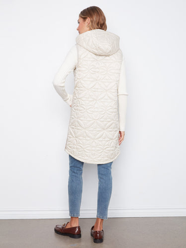 A cozy hood tops off this elegant vest, providing extra warmth and style during chilly weather outings by Charlie B.