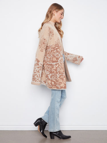 With practical patch pockets, this cardigan combines functionality with fashion, making it a must-have addition to your wardrobe by Charlie B.