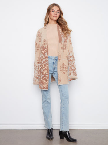 Fashion-forward cardigan designed to complement various looks effortlessly. By Charlie B.
