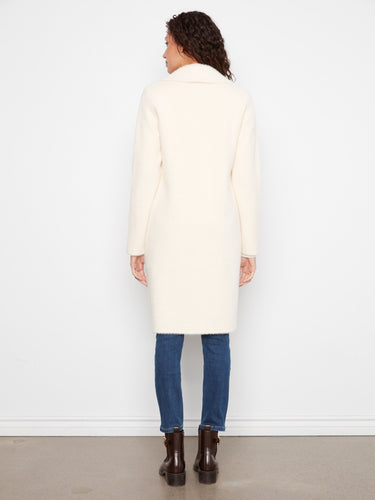 Classic design with button details, offering both sophistication and comfort. By Charlie B.