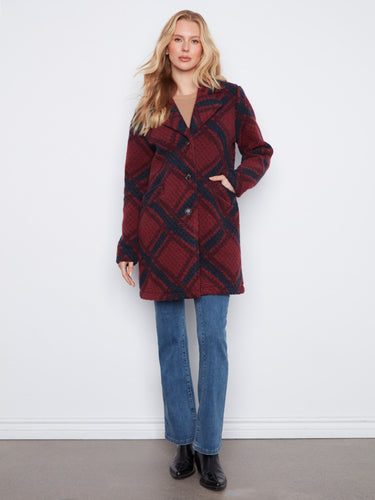 Plaid coat with a tailored collar and button-front closure, ideal for a chic look. By Charlie B.