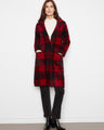 This coat features a notched collar and front button closure, offering a timeless style with modern comfort by Charlie B.