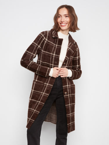 This stylish coat includes front button closure, offering both functionality and a sleek look for cooler days. By Charlie B.