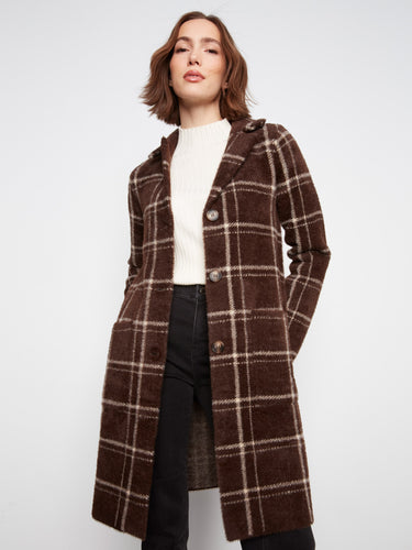 Crafted from high-quality materials, this versatile coat effortlessly complements various outfits and occasions. By Charlie B.