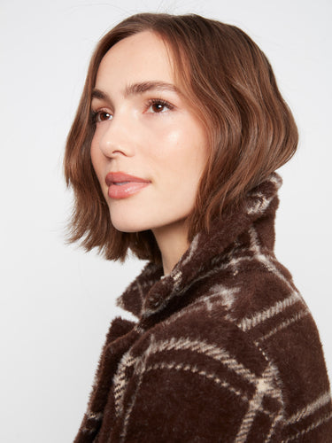 The luxurious texture of the fabric adds sophistication and warmth, making it ideal for seasonal transitions. By Charlie B.