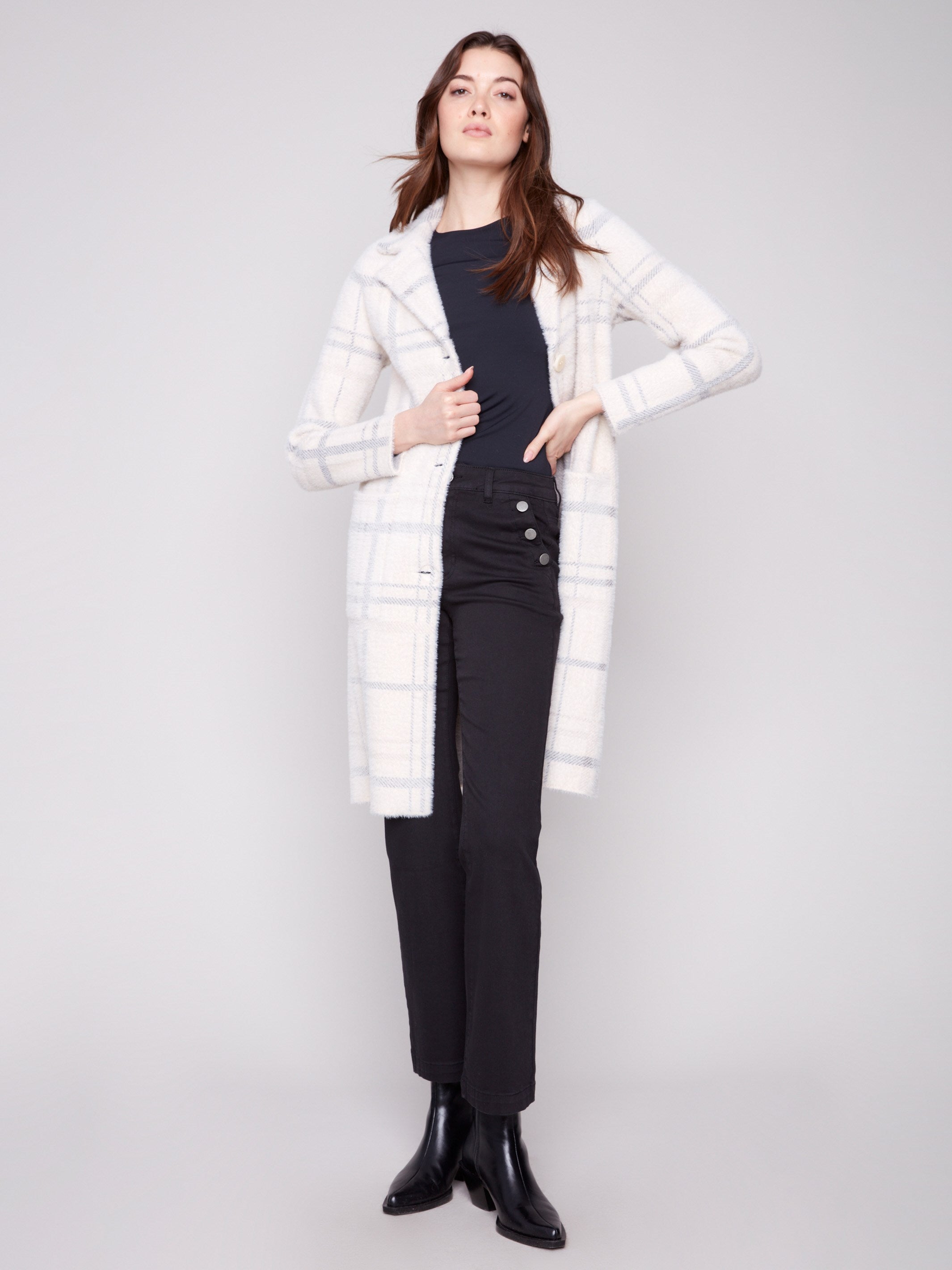 Chic ivory coatigan with two practical side pockets, ideal for carrying essentials by Charlie B.