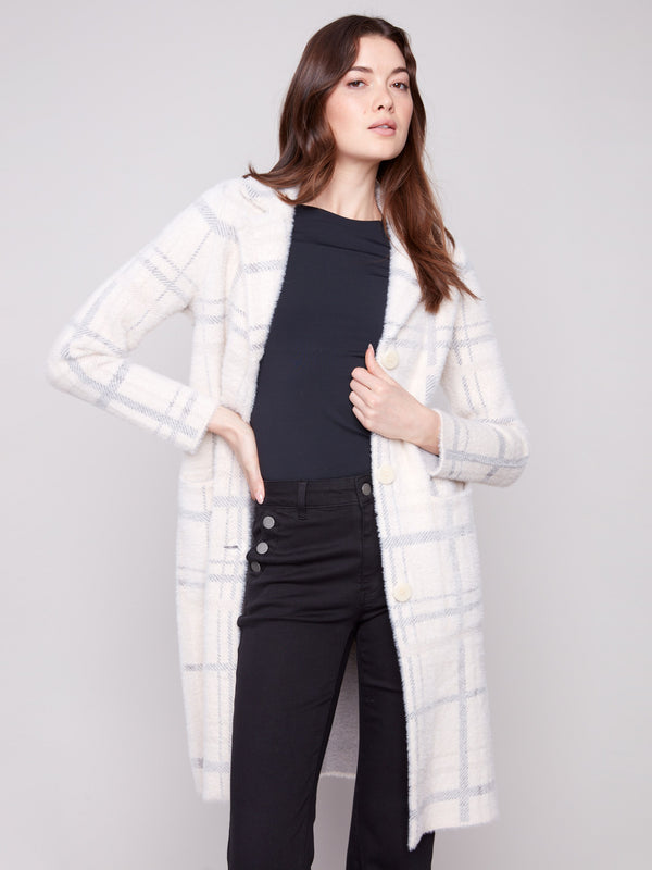 Ivory plaid coatigan crafted from plush fabric, offering warmth and elegance combined by Charlie B.