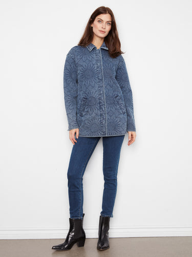Quilted denim jacket in medium blue with floral patterns, featuring a relaxed fit and welt pockets for comfort by Charlie B.