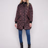 Mocha quilted puffer jacket with rib knit collar, featuring a sleek zipper front and snap buttons by Charlie B.