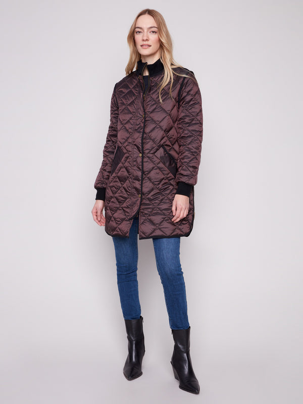 Chic mocha long puffer with two front welt pockets, perfect for keeping essentials handy by Charlie B.