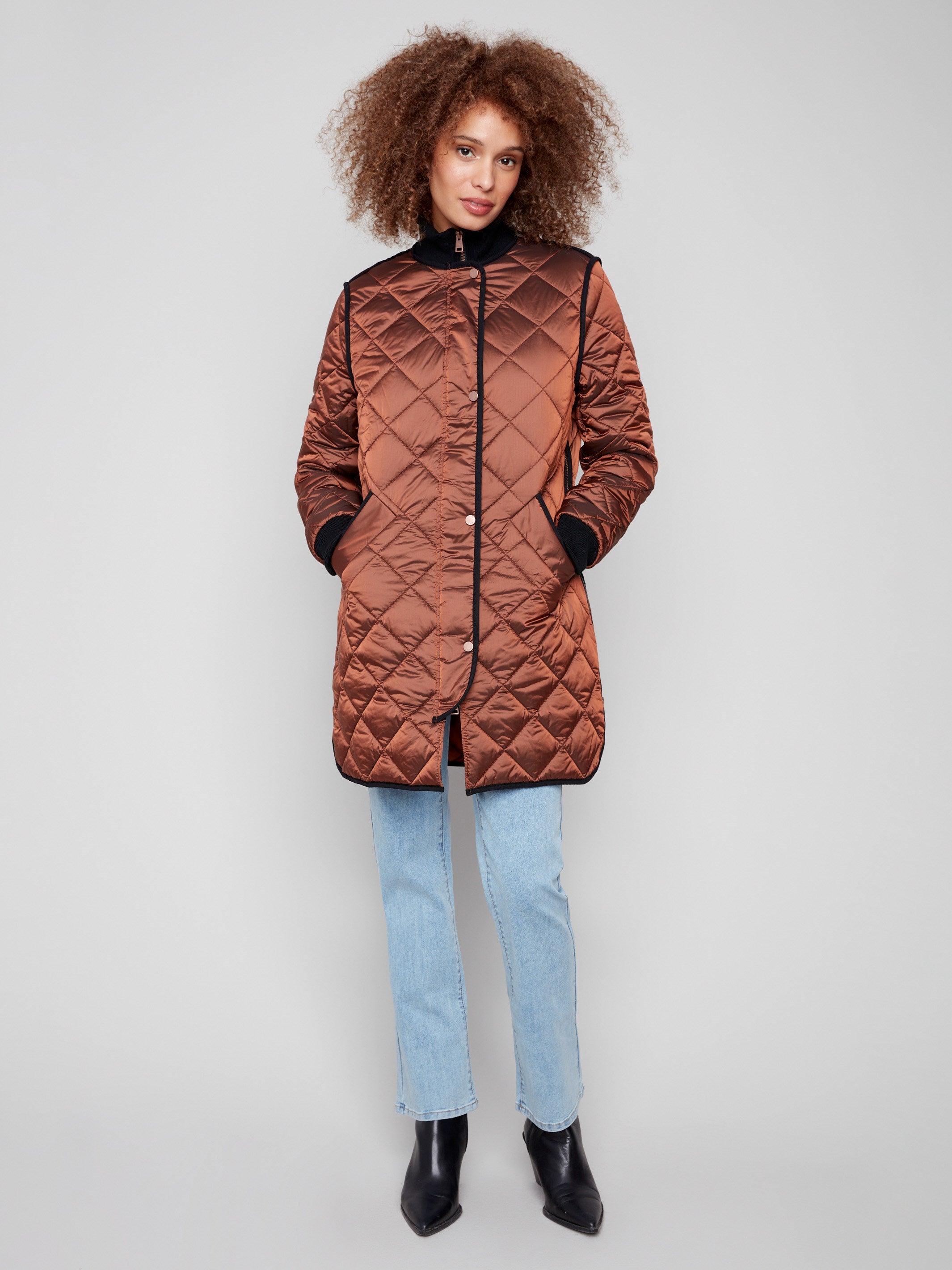 Sepia quilted puffer jacket featuring rib knit detailing on collar and cuffs by Charlie B.