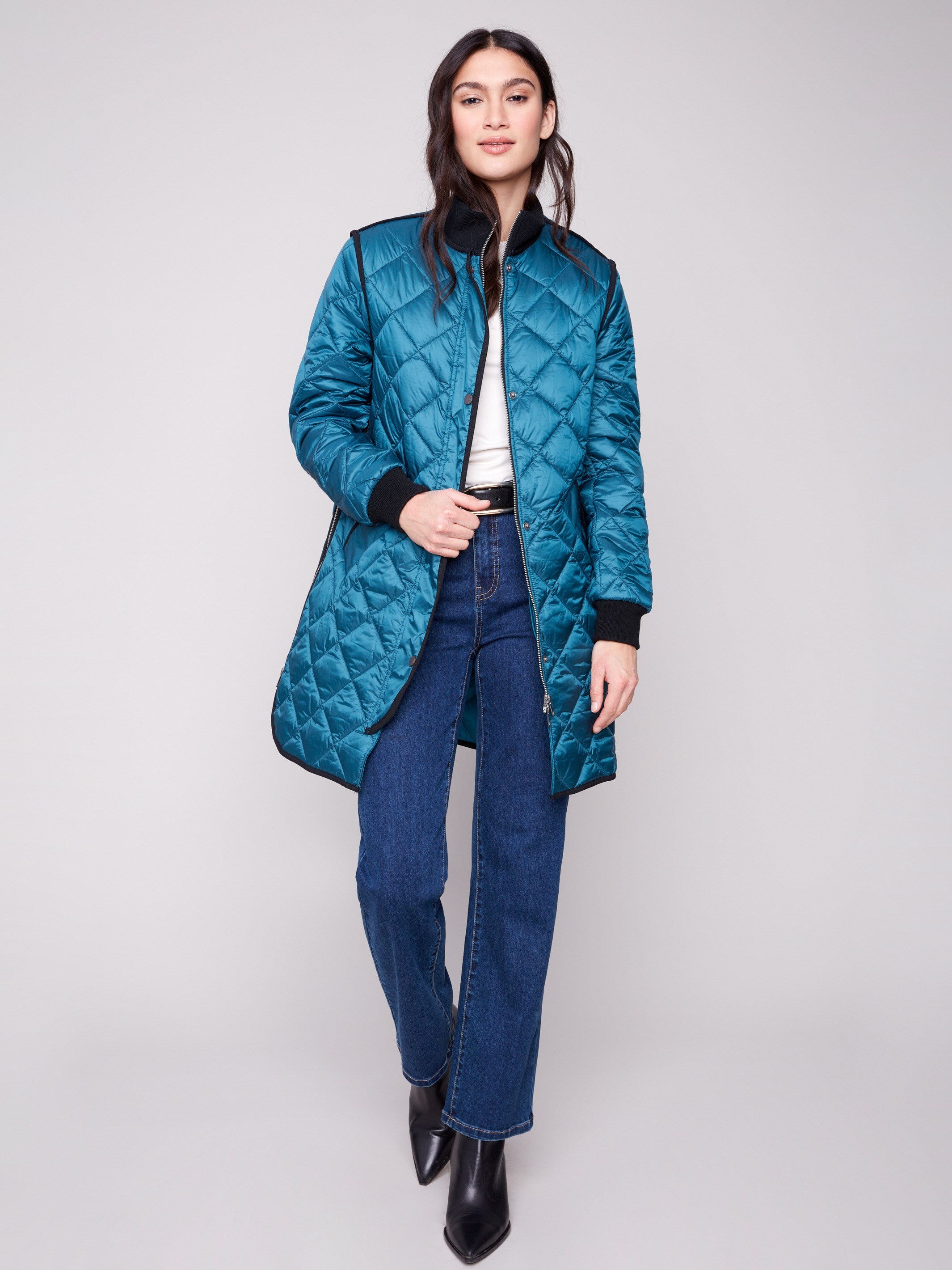 Evergreen quilted puffer jacket with rib knit detailing and stylish side zipper accents by Charlie B.