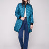 Evergreen quilted puffer jacket with rib knit detailing and stylish side zipper accents by Charlie B.