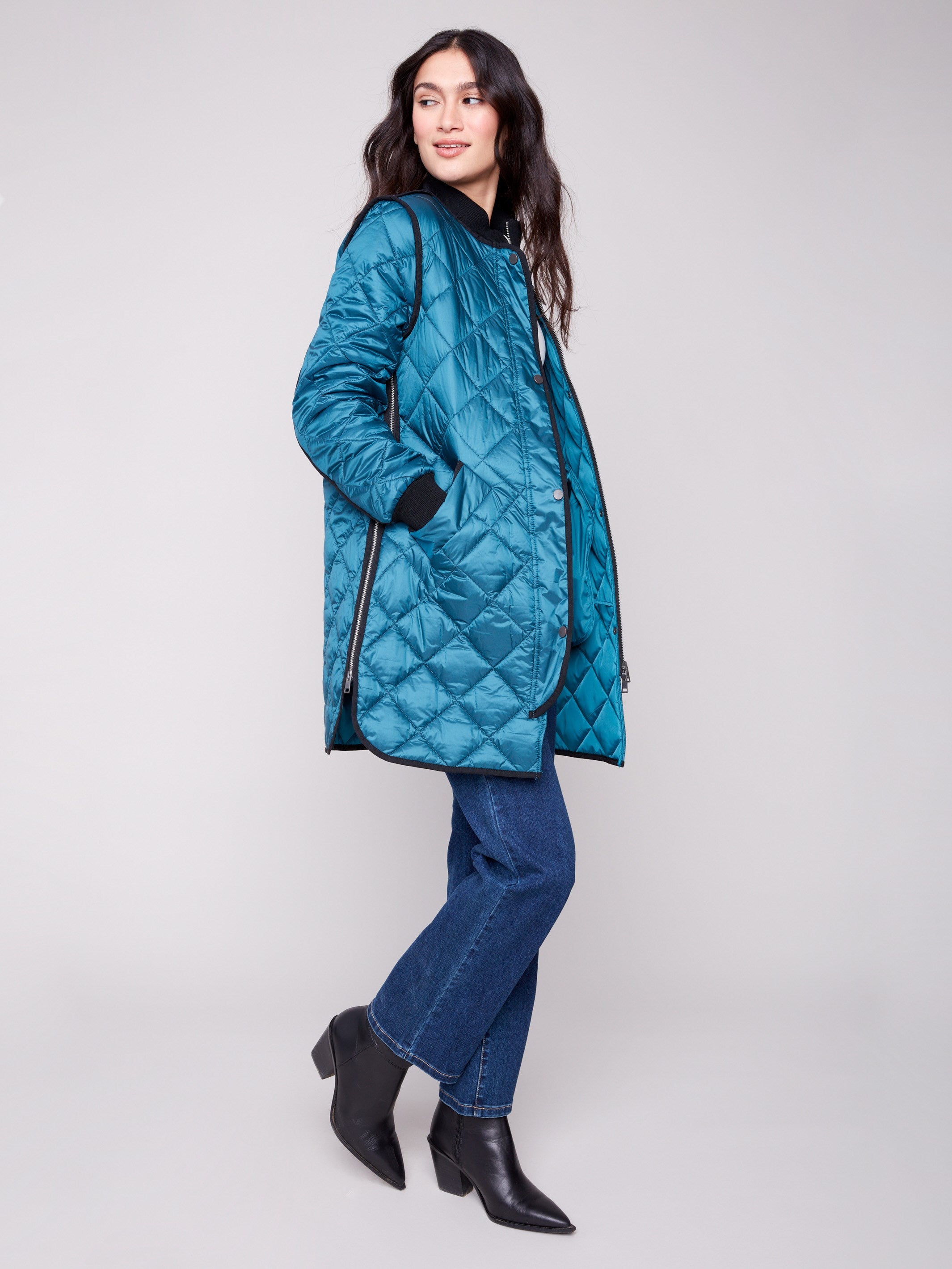 Chic quilted design on this evergreen jacket, complete with functional two front welt pockets by Charlie B.