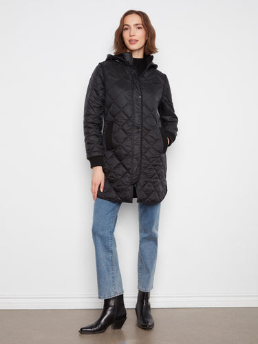 Chic quilted coat with a removable hood for versatile styling. Perfect for changing weather, it offers both style and function by Charlie B.