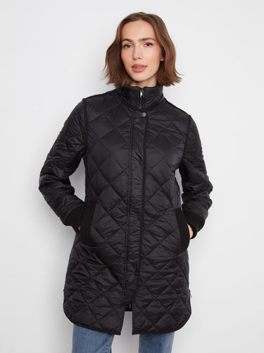 Fashionable black jacket showcasing its detachable hood feature, perfect for adapting to various styles and seasons effortlessly by Charlie B.